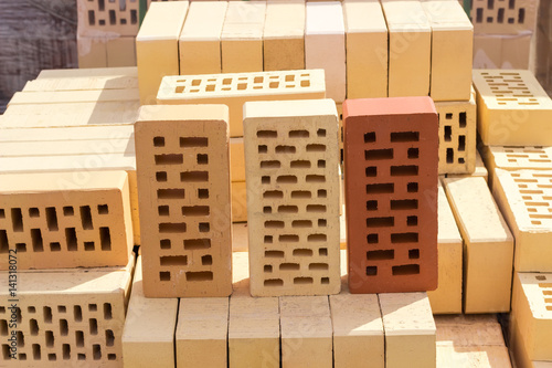 Perforated bricks of different colors with rectangular holes