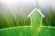 Concept artistic eco healthy living house on blurred meadow background. Concept artistic eco healthy living house on blurred meadow background.