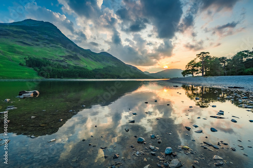 Breathtaking lake reflection at lake at sunset, England