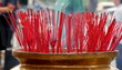lighted red incense sticks Incense sticks are usually lighted by worshipers in temples, churches and in shrines lighted red incense sticks Incense sticks are usually lighted by worshipers in temples, churches and in shrines