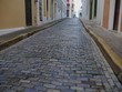 Cobblestone street of Old San Juan, Puerto Rico Narrow cobblestone streets add to the quaint atmosphere of Old San Juan, Puerto Rico. Cobblestone street of Old San Juan, Puerto Rico Narrow cobblestone streets add to the quaint atmosphere of Old San Juan, Puerto Rico.