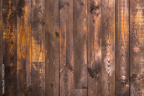 Fototapeta Brown wooden vertical boards. Texture for the background. Horizontal frame