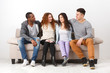Party with friends, young people sitting on couch Party with friends, young people sitting on couch