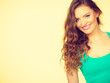 Portrait, young woman wearing colorful makeup and blue top Portrait, young woman wearing colorful makeup and blue top