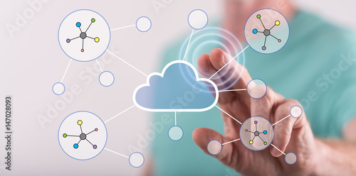 Man touching a cloud networking on a touch screen