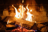 fire burns in the fireplace