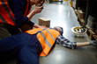 One of workers reporting work accident by walkie-talkie One of workers reporting work accident by walkie-talkie