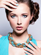 Young beautiful woman with jewelry. Young beautiful woman with jewelry.