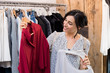 Woman buying dresses Woman buying dresses