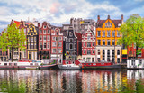 Amsterdam Netherlands dancing houses over river Amstel landmark