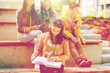 high school student girl reading book outdoors high school student girl reading book outdoors