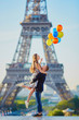 Romantic couple near the Eiffel tower in Paris Romantic couple near the Eiffel tower in Paris