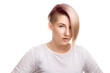 Portrait of a blond young woman with a shaven temple on a white background, isolated Portrait of a blond young woman with a shaven temple on a white background, isolated