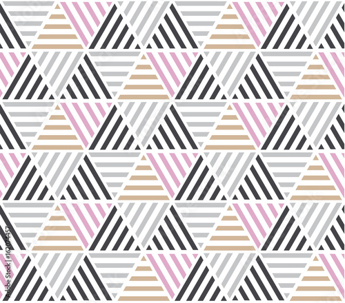 Modern style vector illustration for surface design. Abstract seamless pattern with triangle motif in natural beige and gray colors.