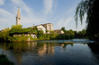 The cathedral of San Nicolò is reflected on Livenza river in Sacile. Italy The cathedral of San Nicolò is reflected on Livenza river in Sacile. Italy
