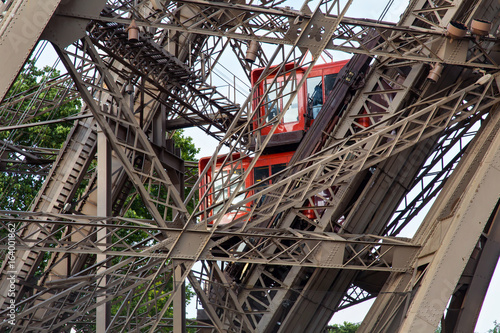 Elevator of the Eiffel Tower in Paris. France. The Eiffel Tower was constructed from 1887-1889 as the entrance to the 1889 World's Fair by engineer Gustave Eiffel. Photo by Renar
