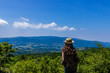 Beautiful young girl with hat enjoy the panoramic view Beautiful young girl with hat enjoy the panoramic view