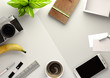 Top down view of a business desktop with a smartphone, office accessories,a journal, coffee and snacks. 3D illustration render. Top down view of a business desktop with a smartphone, office accessories,a journal, coffee and snacks. 3D illustration render.