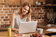 Joyful brilliant woman enjoying her free working schedule Joyful brilliant woman enjoying her free working schedule