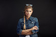 Studio portrait of stylish young woman in casual clothes over black background. Studio portrait of stylish young woman in casual clothes over black background.