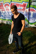 fashion man model on graffity wall fashion man model on graffity wall