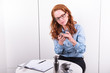 female buyer is inspecting machine parts in the office female buyer is inspecting machine parts in the office