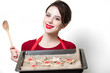 young housewife with gingerbread cookie young housewife with gingerbread cookie