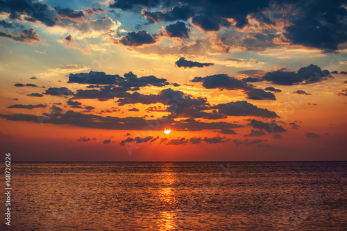 Beautiful sunrise over the sea and colorful sky