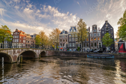 Amsterdam city skyline at canal waterfront, Amsterdam, Netherlands