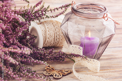 Pink heather, purple candle pot, butterfly © Irina Bort