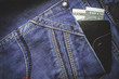 jeans. wallet with dollars in the back pocket. jeans. wallet with dollars in the back pocket.