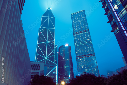 directly below of modern financial skyscrapers in central Hong Kong,blue toned,china.