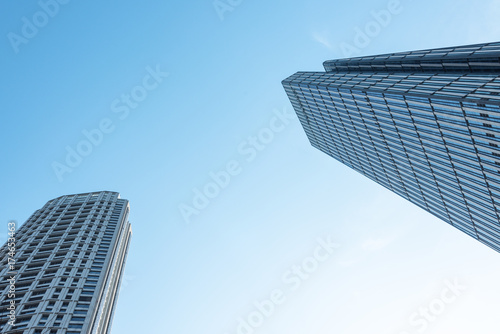directly below of modern financial skyscrapers in central Hong Kong,blue toned,china.