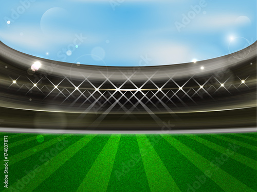 Plakat Boisko do piłki nożnej. Stadion piłkarski. Arena sportowa z trybuną, reflektorami, niebieskim niebem i zieloną trawą.