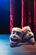 Theater masks, drama and comedy with a red curtain / 3D Rendering, Mixed media. Theater masks, drama and comedy with a red curtain / 3D Rendering, Mixed media.