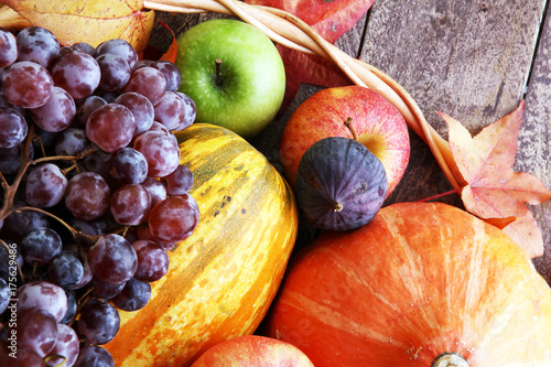 Autumn nature concept. Fall fruit and vegetables on wood. Thanksgiving dinner.