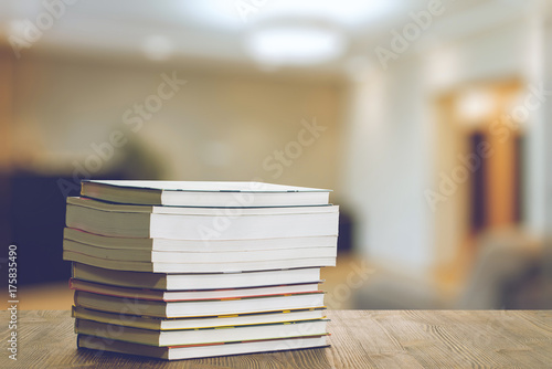 books on wooden table