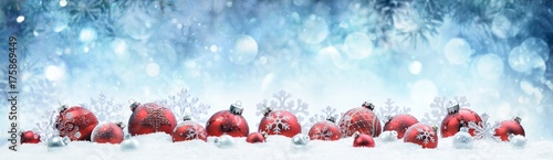 Christmas - Decorated Red Balls And Snowflakes On Snow
