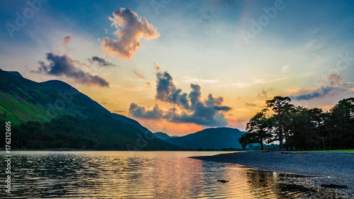 Stunning colorful dusk at lake in District Lake, UK