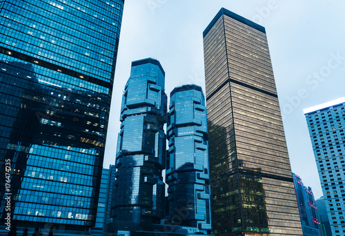 directly below of modern financial skyscrapers in central Hong Kong,blue toned,china.