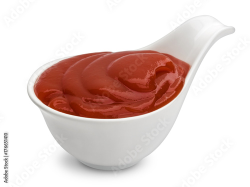 Bowl of ketchup isolated on white background