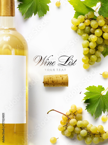 wine list background; sweet white grapes and wine bottle
