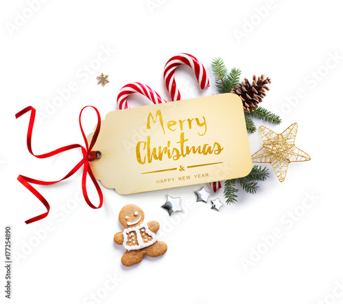 Christmas holiday Decoration; Christmas composition with fir tree branches and holiday ornament on white background. Flat lay, top view