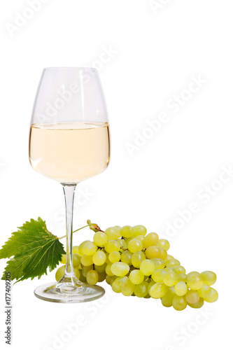 Glass of wine with grapes and leaves isolated on white with sample text