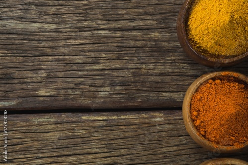 Spice powder on wooden table