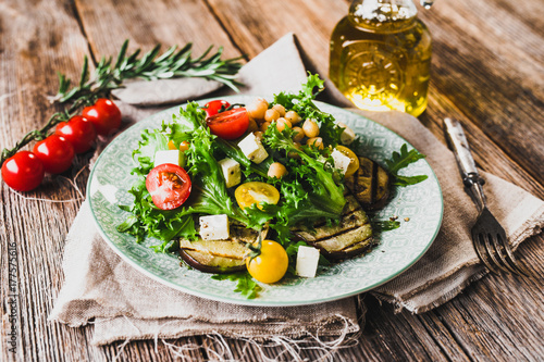 Fresh healthy salad with chickpea and griled eggplant