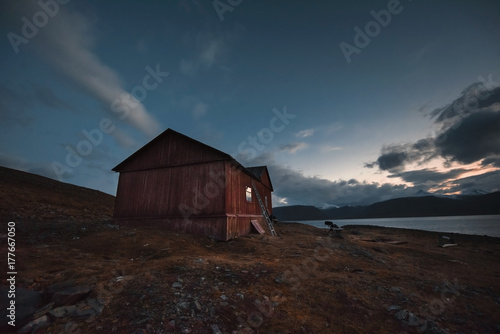The polar arctic autumn blue sky evening star in Norway Svalbard in Longyearbyen the moon mountains