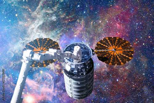 The Cygnus spacecraft in open space.