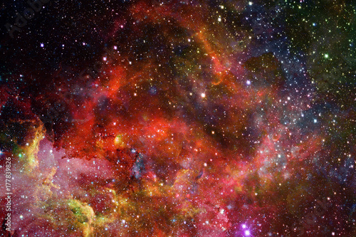 Nebula and galaxies in dark space. Elements of this image furnished by NASA.