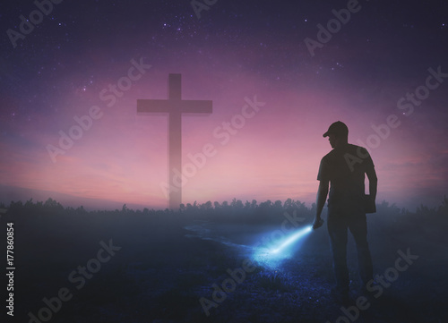 Man looking for cross